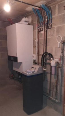 Installation d'une chaudière Viessmann Vitodens 222 W nouvelle génération, accompagnée d'un kit pour plancher chauffant et d'un adoucisseur North Star hybride